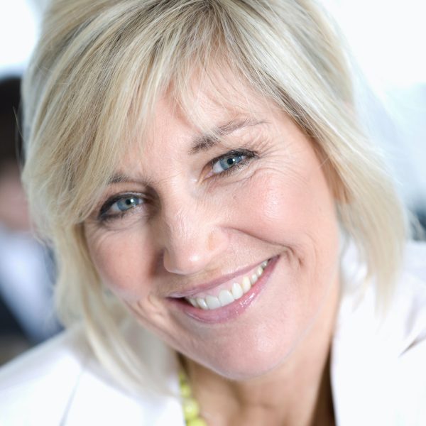 portrait-of-an-older-smiling-businesswom.jpg